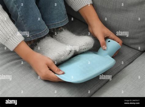 Woman Hot Water Bottle Feet Hi Res Stock Photography And Images Alamy