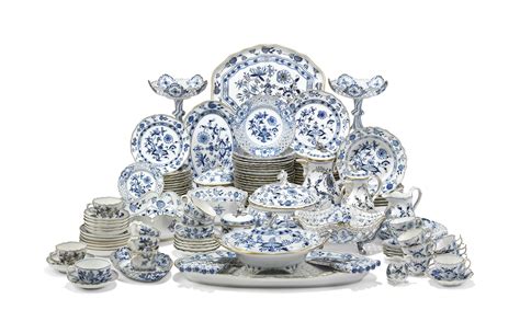 A MEISSEN PORCELAIN BLUE ONION-PATTERN COMPOSITE PART TABLE-SERVICE ...