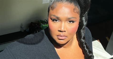 Lizzo's Teased Hairstyle Features Sky-High Volume & Swooped Edges