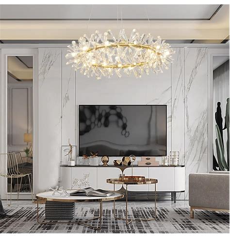 One Tier Crystal Chandelier In Front Of Marble Feature Wall Design