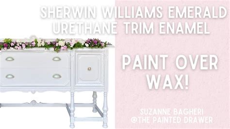 A White Dresser With Flowers On Top And The Words Paint Over Wax