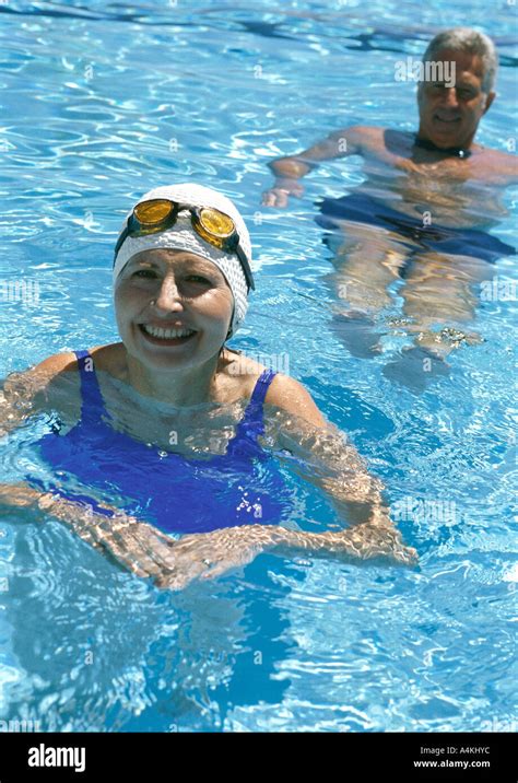Mature Couple In Pool Stock Photo Alamy