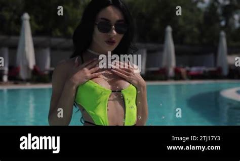 Sexy Frisky Woman In Bikini Having Fun In The Swimming Pool Stock Video Footage Alamy