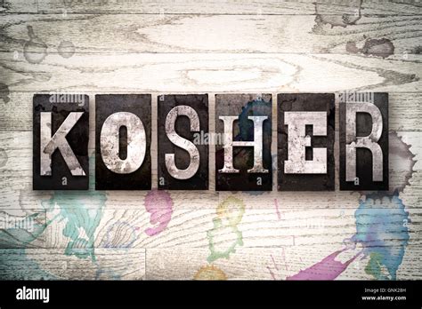 The Word KOSHER Written In Vintage Dirty Metal Letterpress Type On A