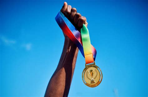 Free picture: Sports medals on a blue background, a gold medal with the ...