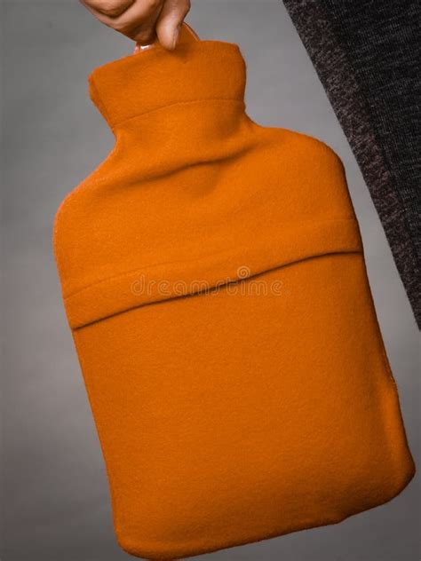 Woman Holds Hot Water Bottle In Red Fleece Cover Stock Photo Image Of Woman Treatment