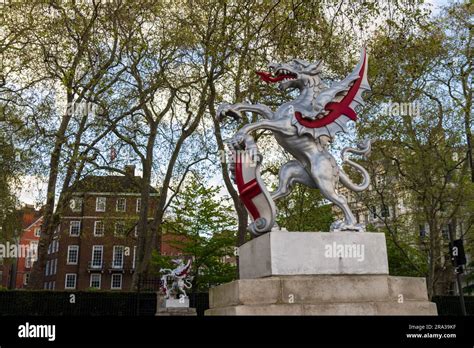 Historic And Iconic London Dragon Statues Holding A Shield With The