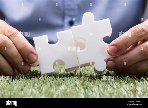 Business People Connecting Puzzle Pieces Hi Res Stock Photography And