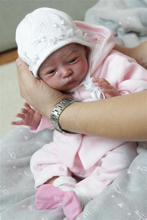 Realistic Reborn Baby Doll in White Lace Dress