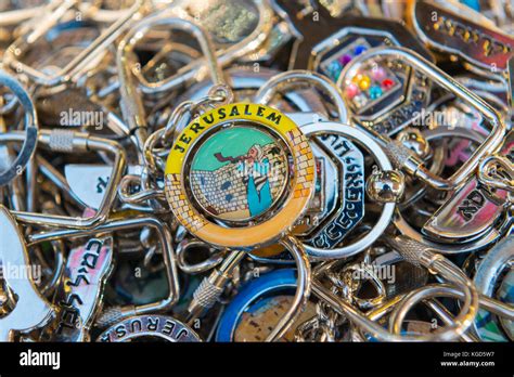 Israel The Holy Land Tel Aviv souvenir memento trinkets pile of metal key rings Jerusalem Rabbi ...