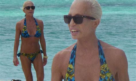 Donatella Versace 58 Shows Off Her Super Svelte Figure In Blue And Gold Bikini During Beach