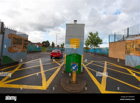 The gates to the peace wall in west Belfast keep the catholics and ...