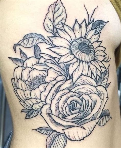 The 25+ best Flower rib tattoos ideas on Pinterest | Rib ... | Back ...