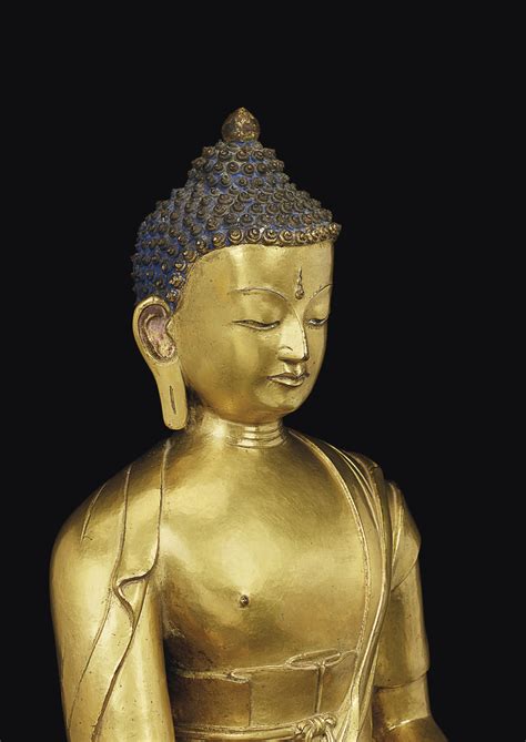 A RARE GILT BRONZE FIGURE OF BUDDHA RATNASAMBHAVA NEPAL 17TH 18TH