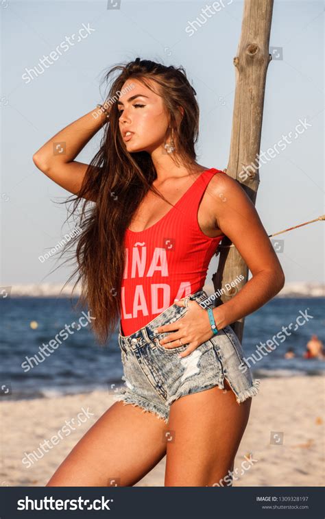 Beautiful Sexy Brunette Girl Denim Shorts Stock Photo 1309328197 Shutterstock