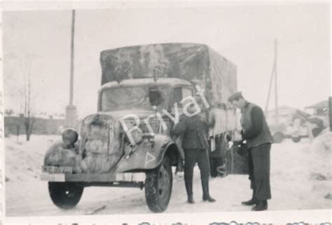 Foto WK II Wehrmacht Fahrzeug LKW WH 891727 Winter Tarn Opel Blitz K1