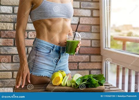 Fit Woman Drinking Vegetable Green Detox Smoothie Raw Food Diet Stock