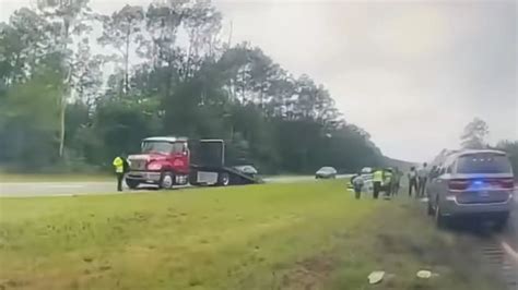 Video Distracted Driver Launches Nissan Off Tow Truck Ramp Like A