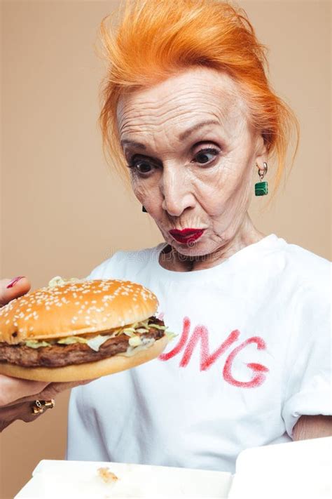 Mature Redhead Fashion Woman Blowing Kisses Stock Photo Image Of Blond European 96933812