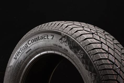 Continental Viking Contact 7-logo on the Side of the Tire Closeup. One ...
