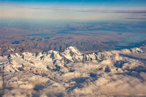 An aerial view of Mount Cook / Aoraki and lake Pukaki in New Zealand ...