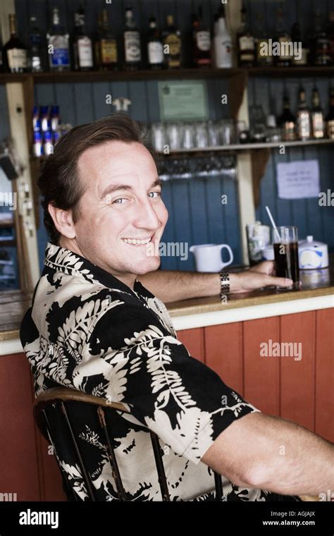 Portrait Of A Mid Adult Man Holding A Glass Of Drink Stock Photo Alamy