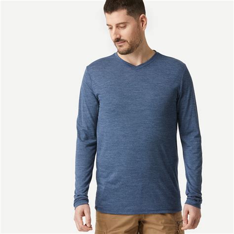 Men S Long Sleeved Travel Trekking Merino Wool T Shirt Travel 500 Blue Forclaz Decathlon