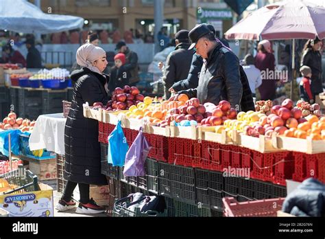 Scene On The Market Local People Buying Food On Market Stalls In Siyob