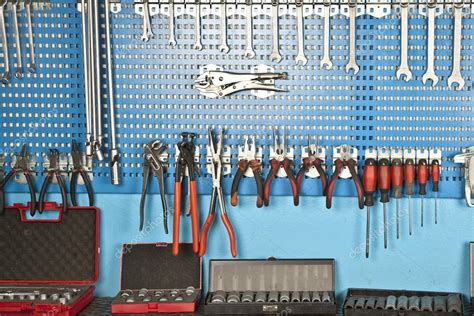 Different Car repair tools set on the wall — Stock Photo © gorkemdemir ...