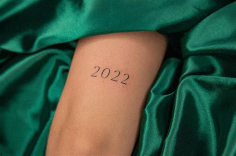 2022 Lettering Tattoo Located On The Tricep