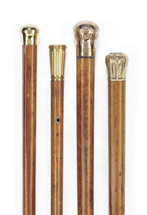 A Group Of Three Gold Mounted Walking Canes 19th Century Christies