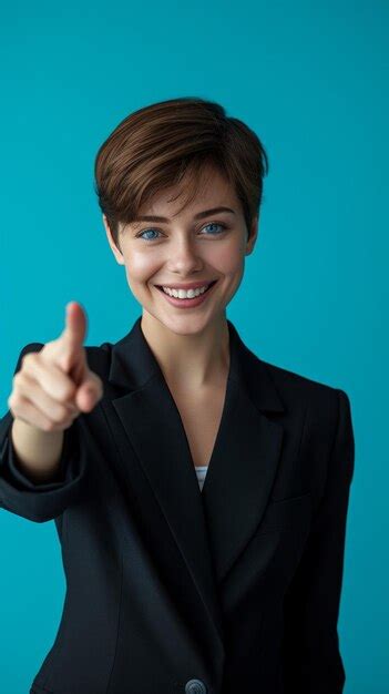 Premium Photo Confident Businesswoman Pointing At Camera