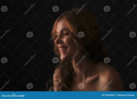 Smiling Blonde Woman In The Shadows Stock Photo Image Of Erotic Body 70359038