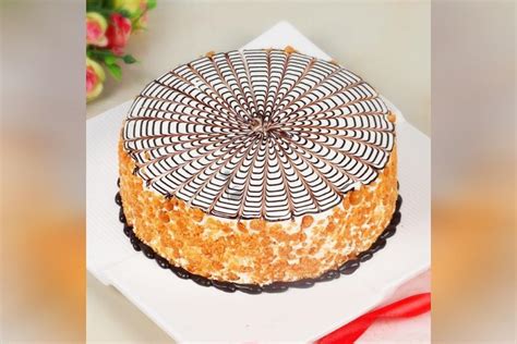 Order Rakhi Butterscotch Cake Online Free Shipping In Delhi Ncr Jaipur