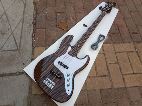 Strings Electric Bass Guitar Zebra Wood Body Neck Bj