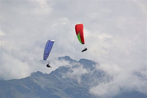 Paragliders in the Alps stock photo. Image of hill, blue - 46213174