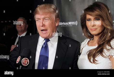 TV personality Donald Trump and wife Melania Trump attend the SiriusXM ...