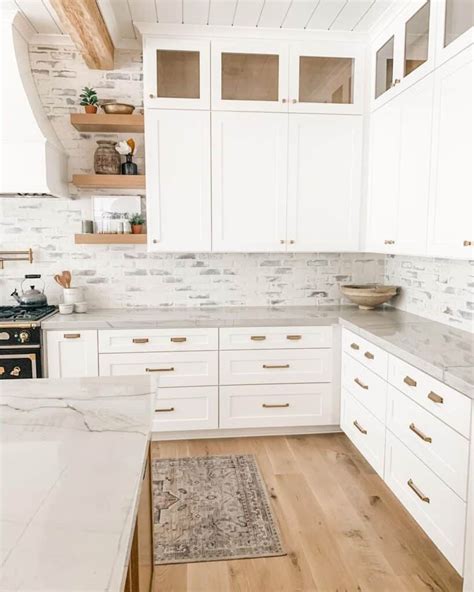 Kitchen with Brass Hardware White Cabinets - Soul & Lane