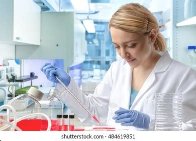 Female Research Scientist Looks Biological Samples Stock Photo Edit