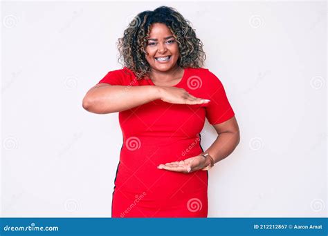 Young African American Plus Size Woman Wearing Casual Clothes Gesturing