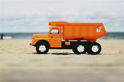 Photo of Orange Dump Truck Toy · Free Stock Photo