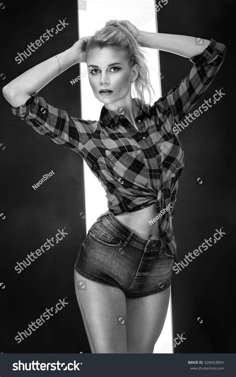 Стоковая фотография Sexy Blonde Woman Long Slim Legs Shutterstock