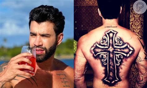 Foto Tatuagem De Gusttavo Lima Uma Cruz Enorme Nas Costas Foi Alvo