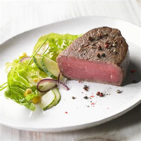 Medium rare steak — dish, cholesterol - Stock Photo | #151256590