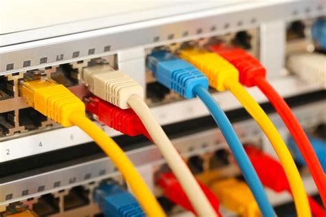 Premium Photo Ethernet Cables Connected To Network Switch Close Up