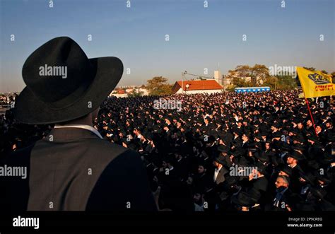 Ultra Orthodox Jewish Men Attend The Funeral Procession Of Rabbi