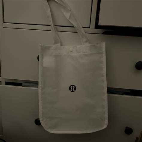 lululemon reusable tote bag has signs of wear from... - Depop