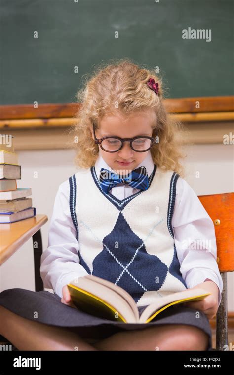 Blonde Pupil Reading A Book Stock Photo Alamy