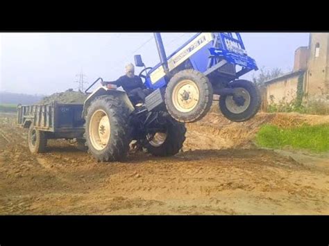 JCB3DX Loading Mud In Two Swaraj Tractor 735FE After Tractor Trolley