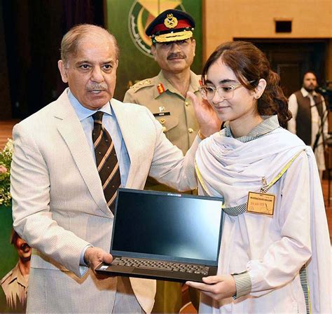 Prime Minister Muhammad Shehbaz Sharif Distributing Laptops Among The